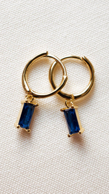 blue baguette dangle earrings close-up photo | avantejewel.com