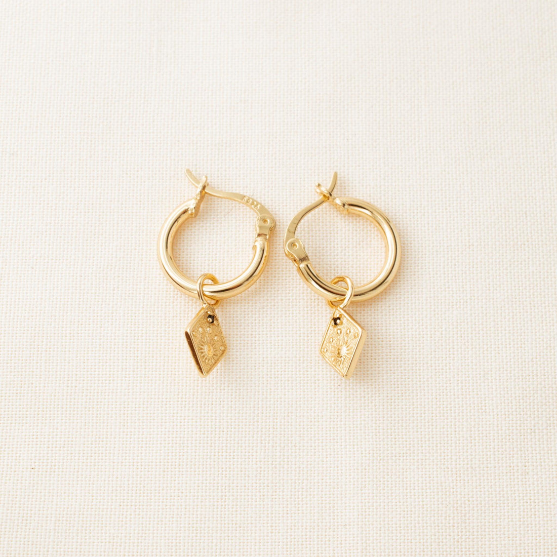 gold-plated sun earrings