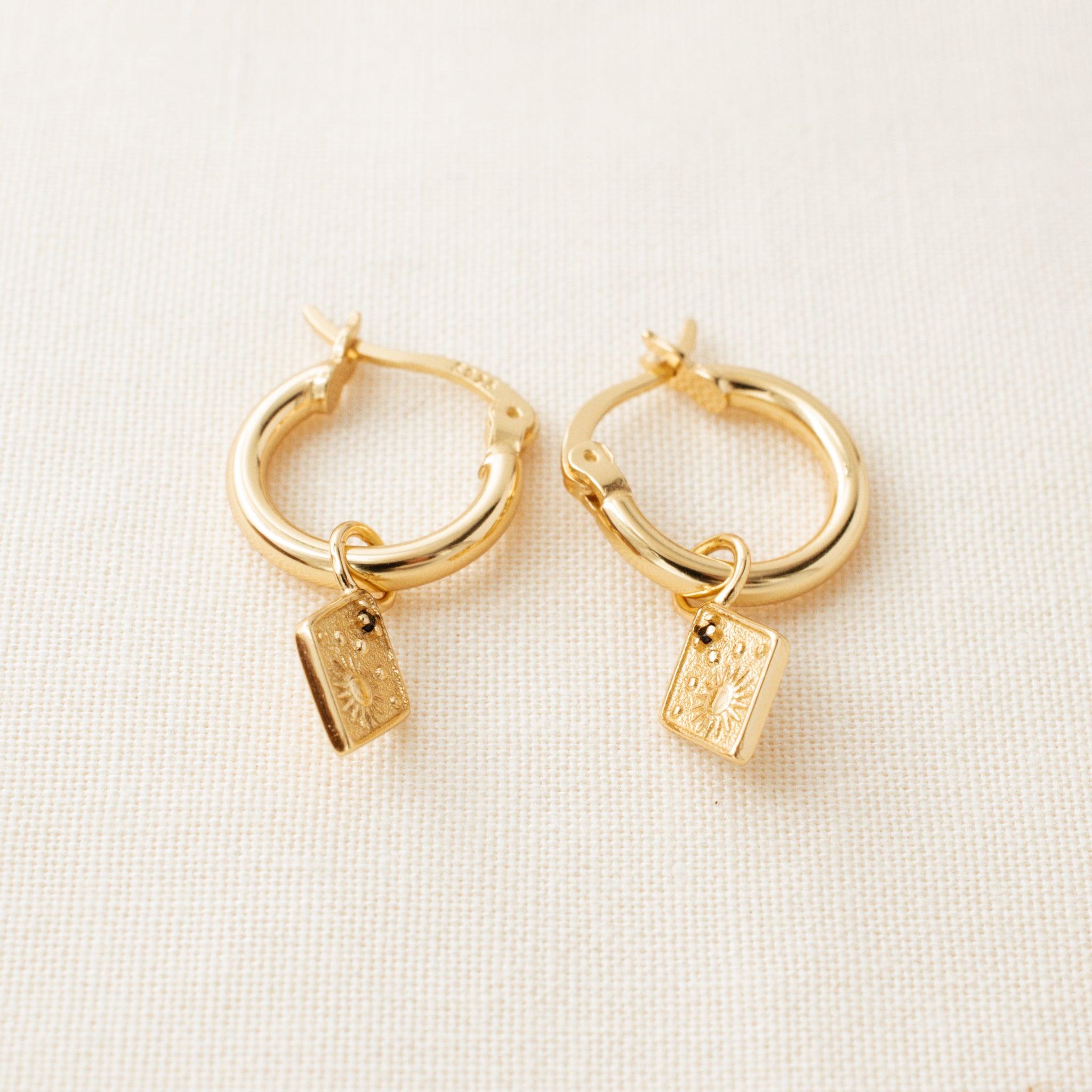 sun earrings charms on gold hoop earrings