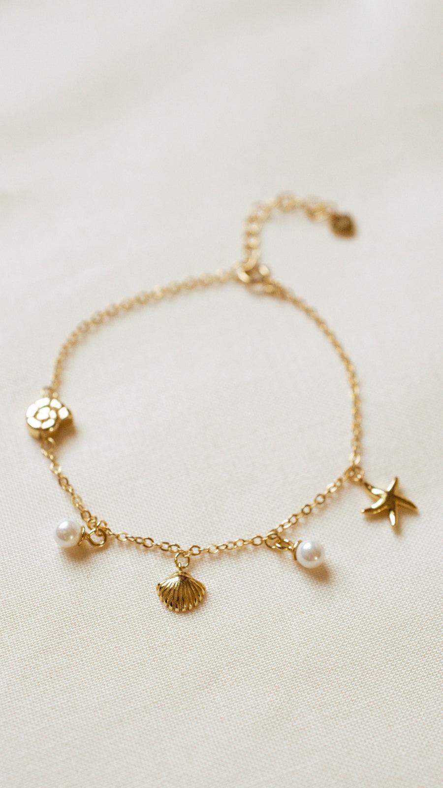 ocean charm bracelet display dainty pearl, starfish and shell charm 