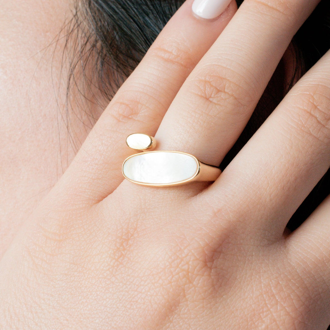 Barbara White Shell Ring on a model